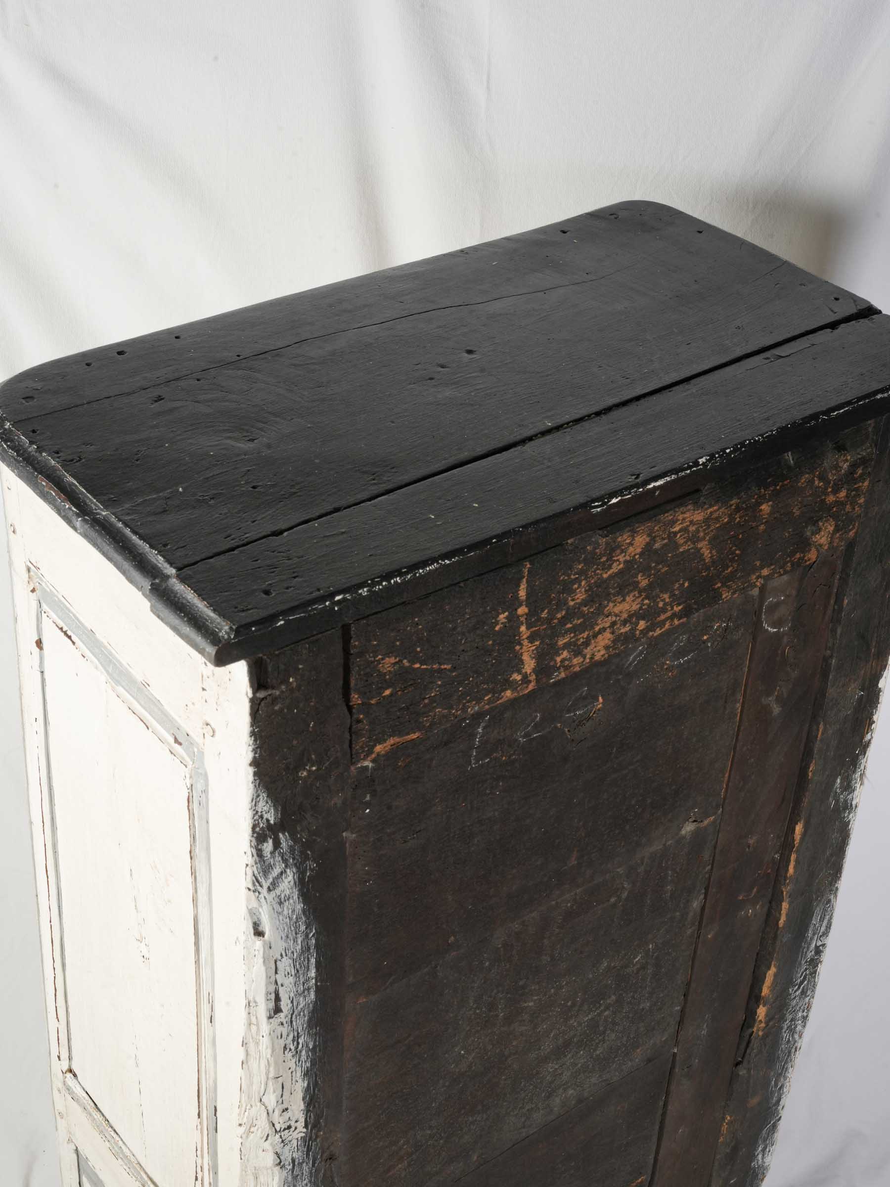 Richly carved off-white cupboard