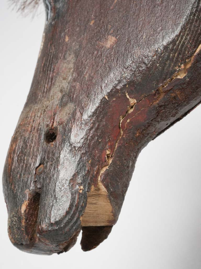 Superb patina on antique pull horse