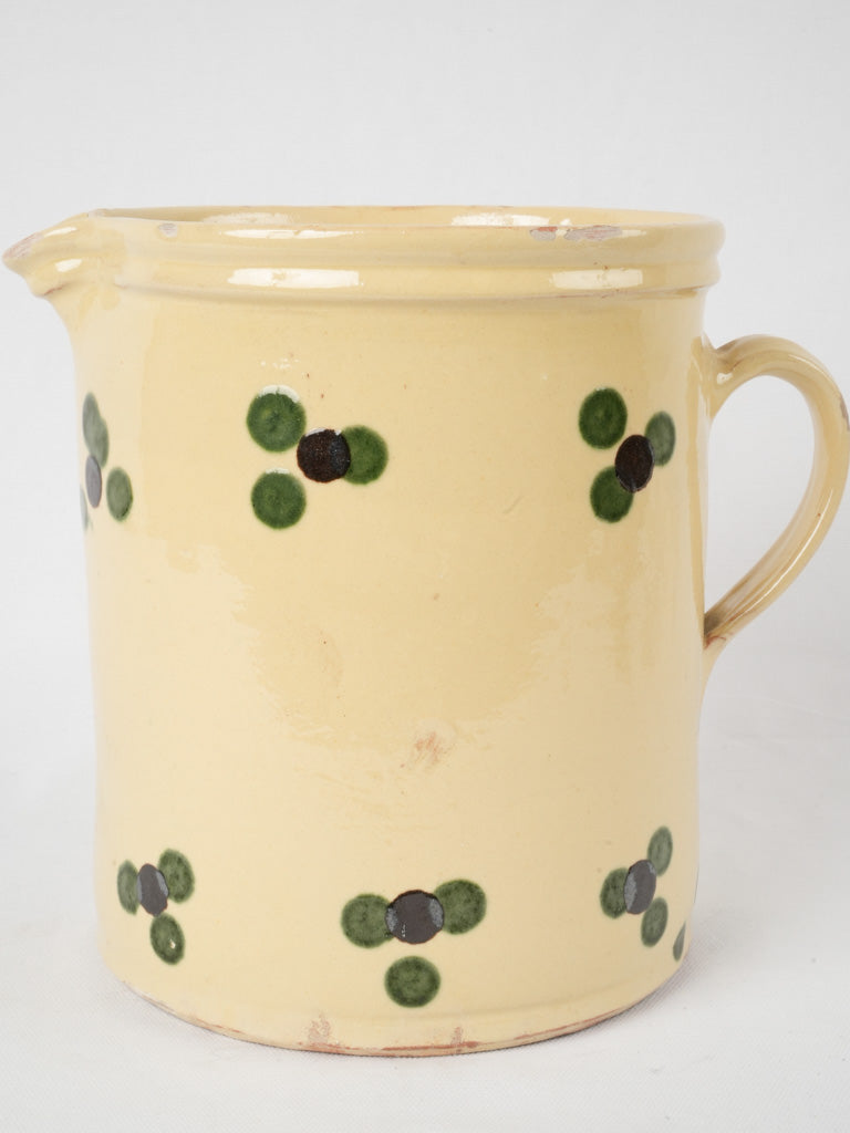 Classic cheery yellow pottery pitcher
