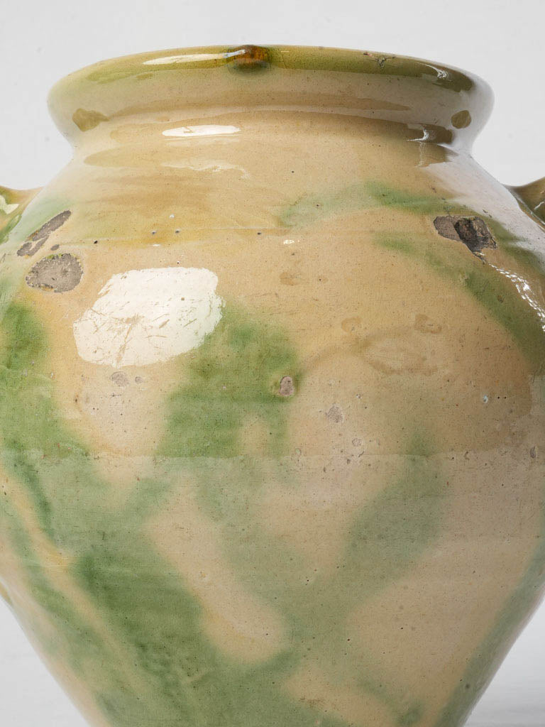 Aged artisan-crafted terracotta crock