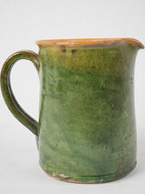 Antique green-glazed French pottery pitcher