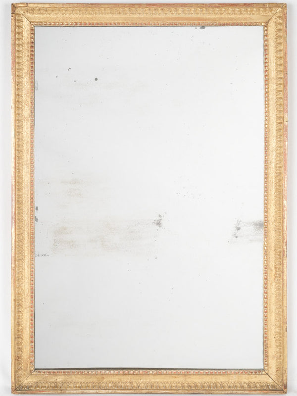Antique gilded Louis XVI mirror