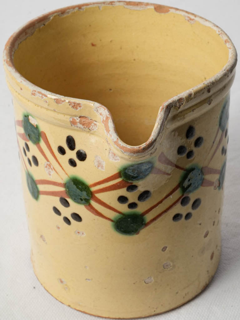 Rustic butter yellow ceramic pitcher