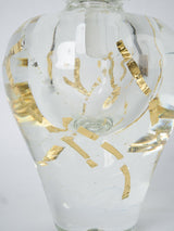 Opulent gold-leafed glass container