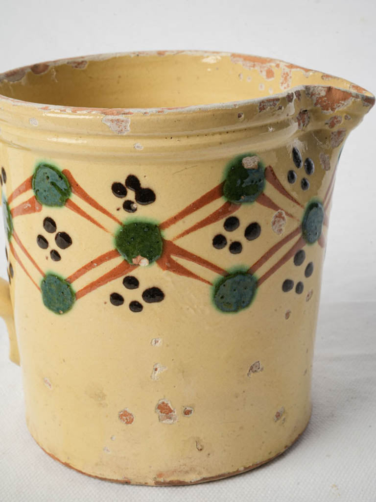 Patina aged charming ceramic pitcher