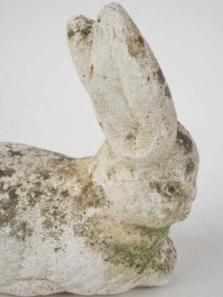 Realistic moss-accented bunny statuette