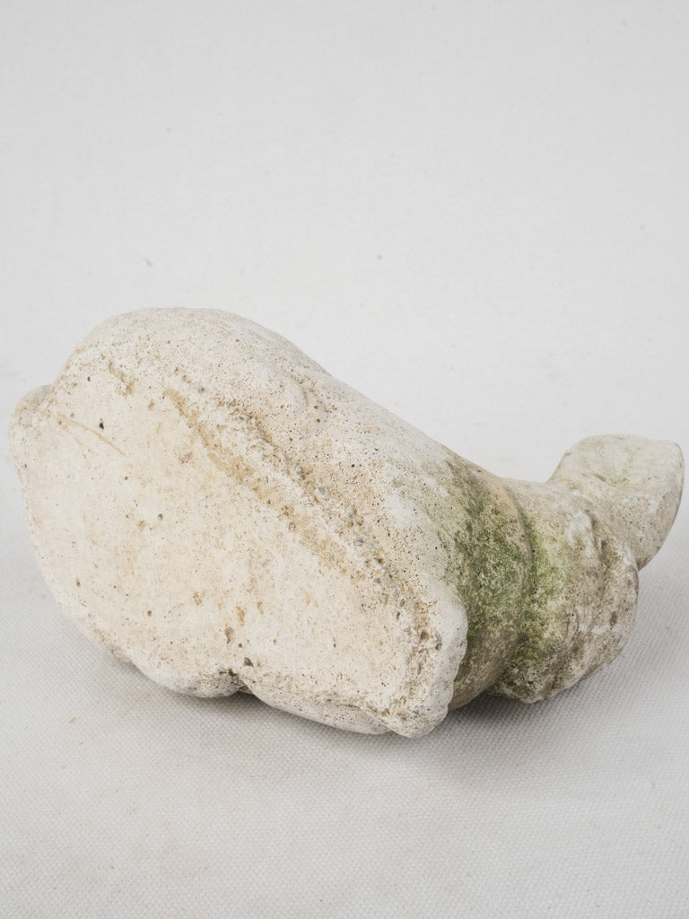Weathered decorative garden rabbit statue