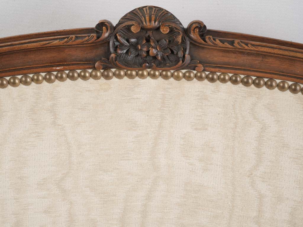 Stylish brass nailhead armchairs