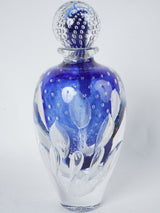 Artistic royal blue lidded glass urn