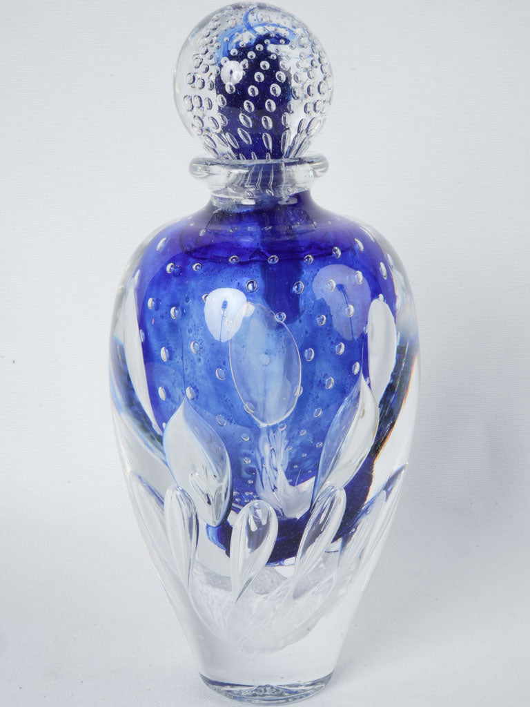 Artistic royal blue lidded glass urn