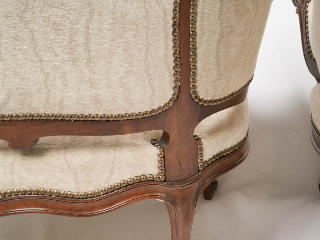 Decorative shell-accented armchairs