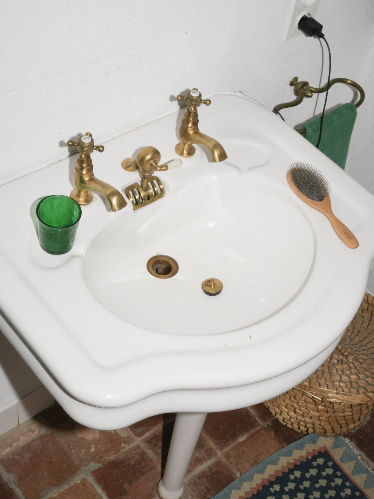 White Porcelain Wall-Mounted Washbasin with Brass Taps