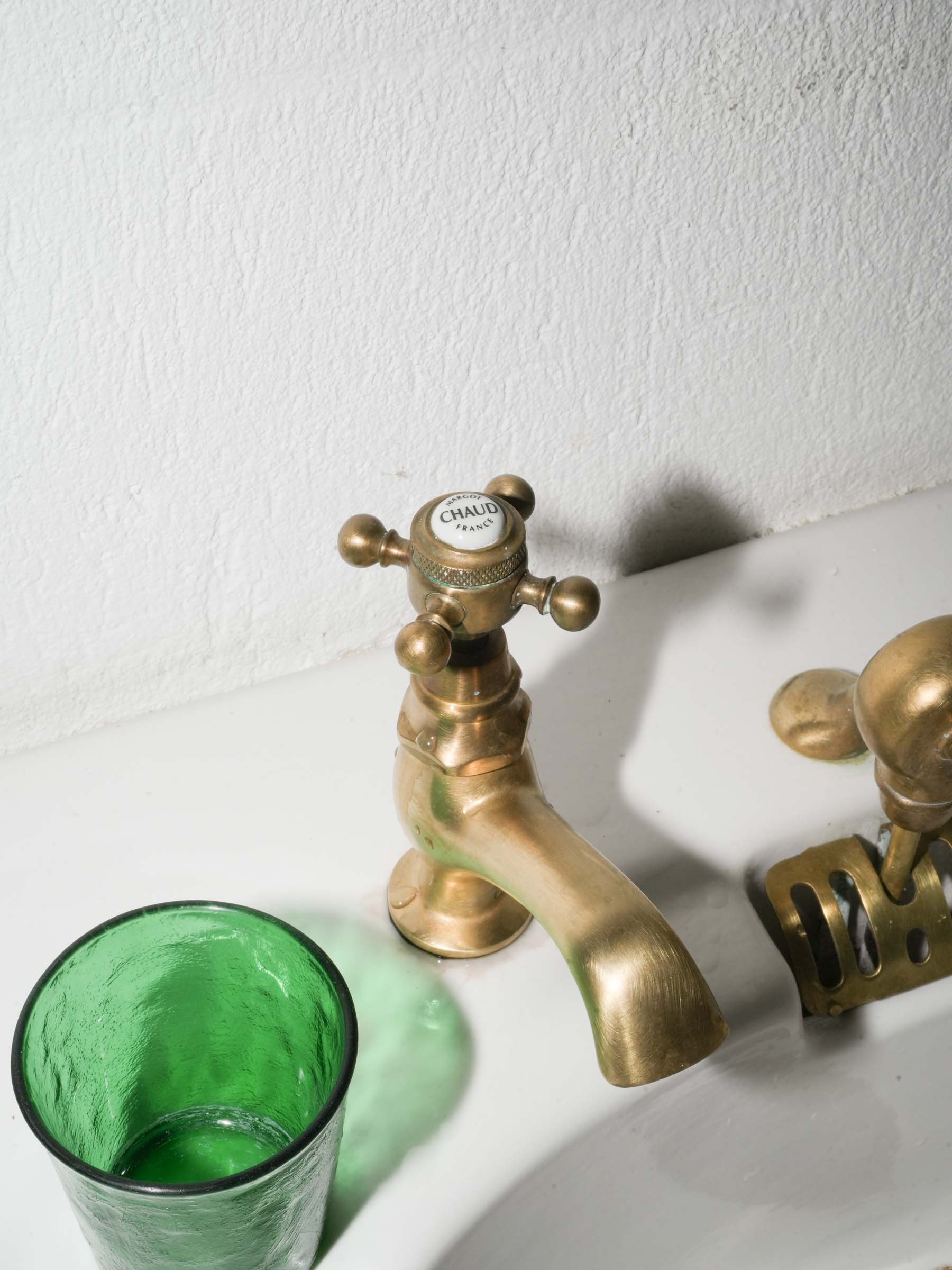 White Porcelain Wall-Mounted Washbasin with Brass Taps