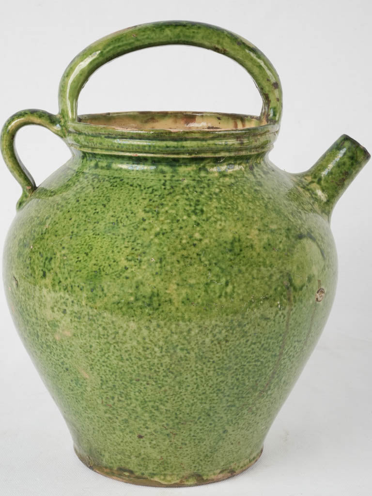 Antique green-glazed French water cruche