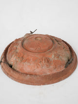 Handcrafted rose-adorned terracotta pot