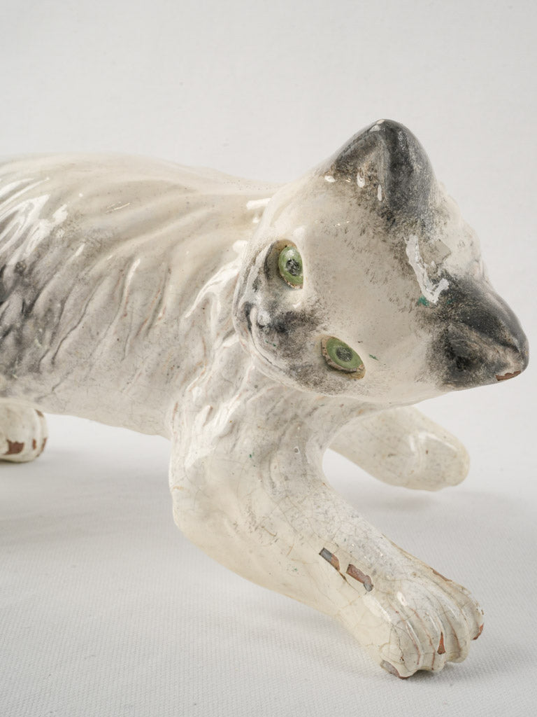 Dynamic climbing ceramic cat art  