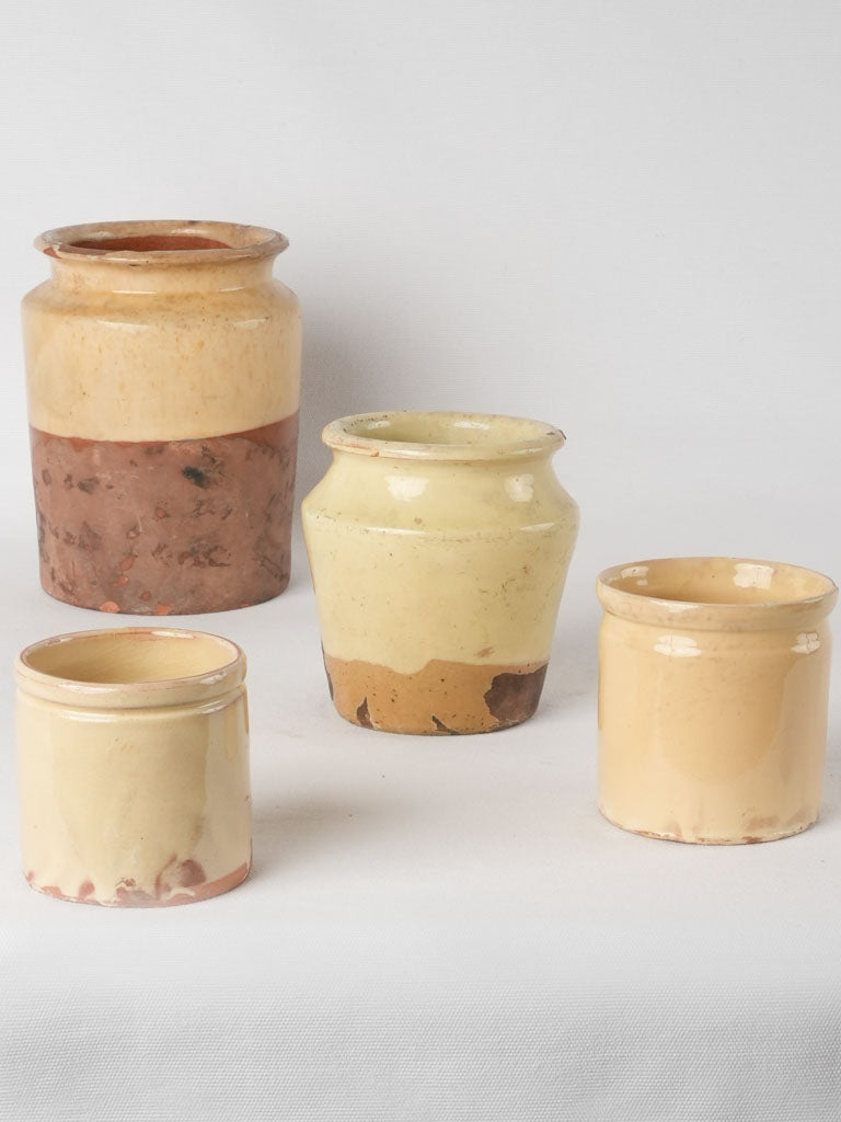 Collection of 4 preserving pots w/ yellow glaze 7½"
