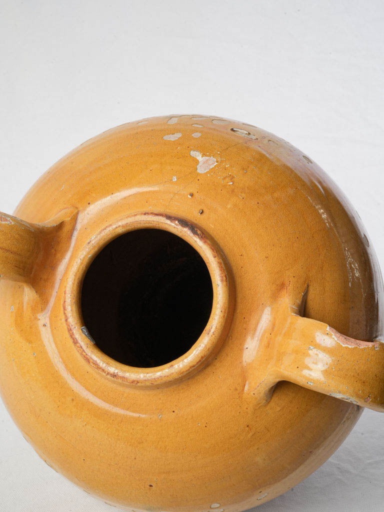 Timeworn ochre glazed container  