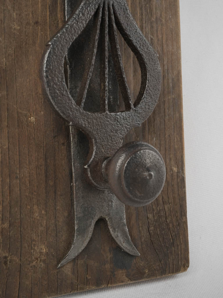 Elegant black wrought door knocker