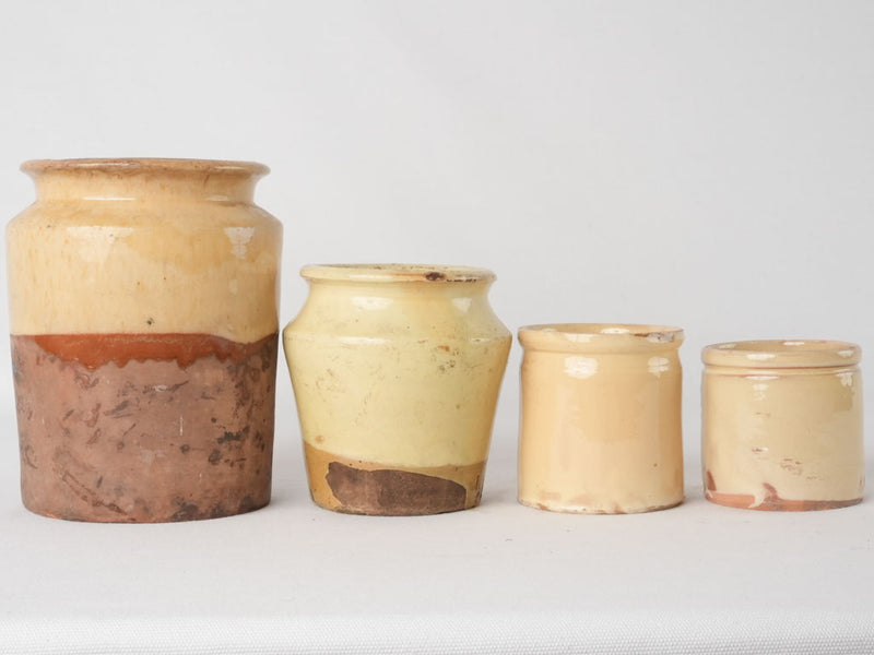 Collection of 4 preserving pots w/ yellow glaze 7½"