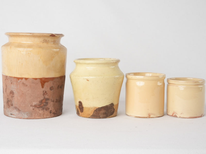 Collection of 4 preserving pots w/ yellow glaze 7½"
