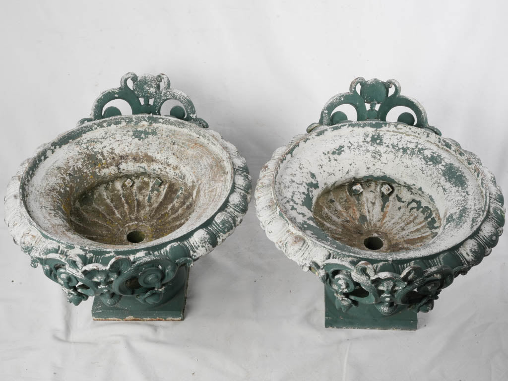 Patina French cast-iron urns  