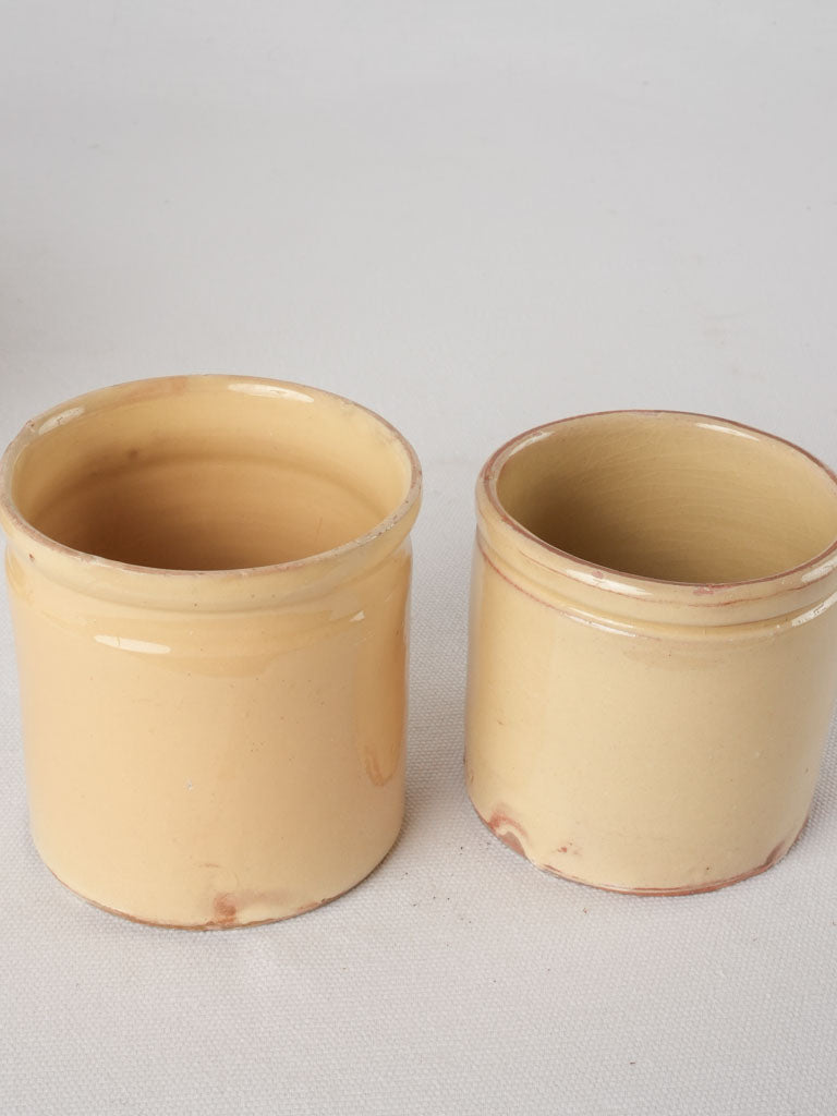 Collection of 4 preserving pots w/ yellow glaze 7½"