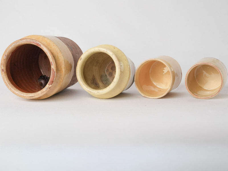 Collection of 4 preserving pots w/ yellow glaze 7½"