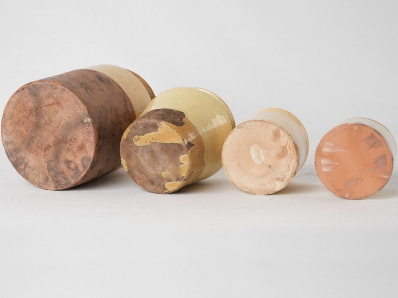 Collection of 4 preserving pots w/ yellow glaze 7½"