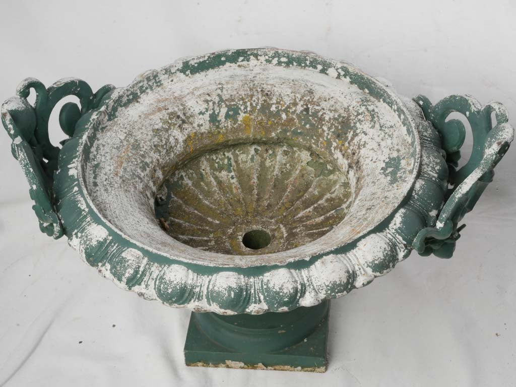 Decorative scroll-handled garden urns  