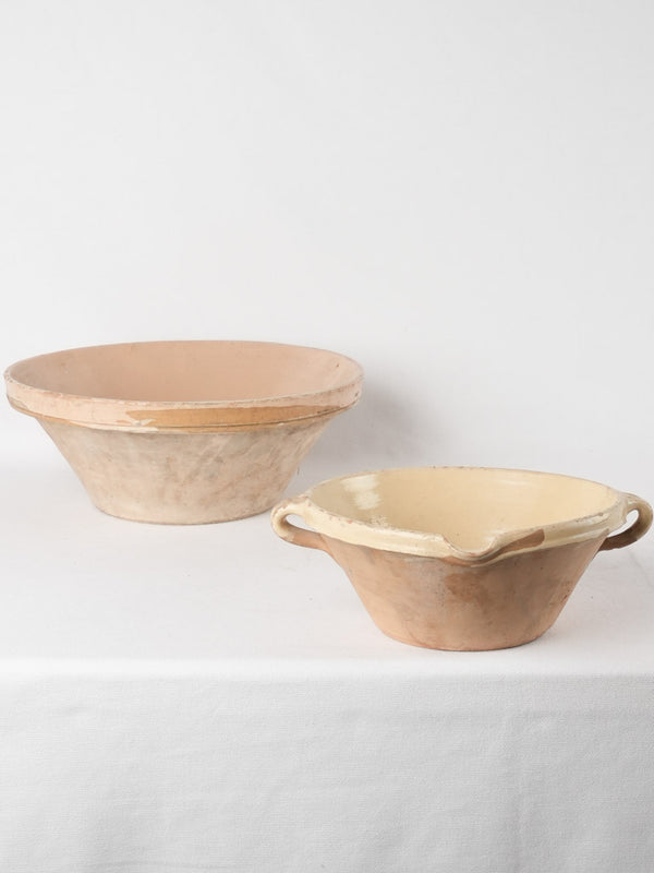 2 terracotta bowls w/ creamy yellow glaze