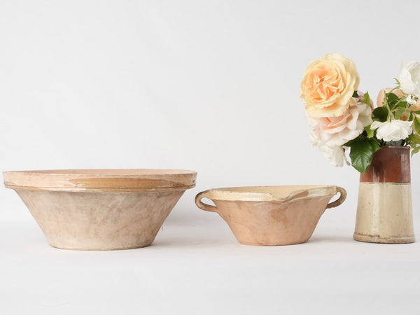 2 terracotta bowls w/ creamy yellow glaze