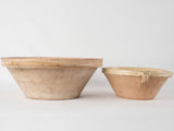 2 terracotta bowls w/ creamy yellow glaze
