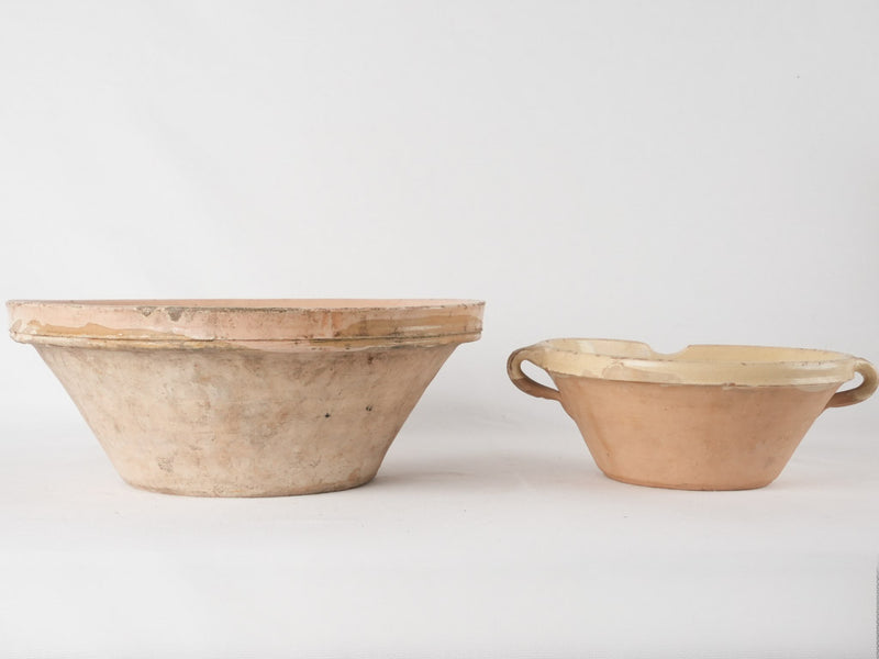 2 terracotta bowls w/ creamy yellow glaze