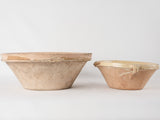 2 terracotta bowls w/ creamy yellow glaze