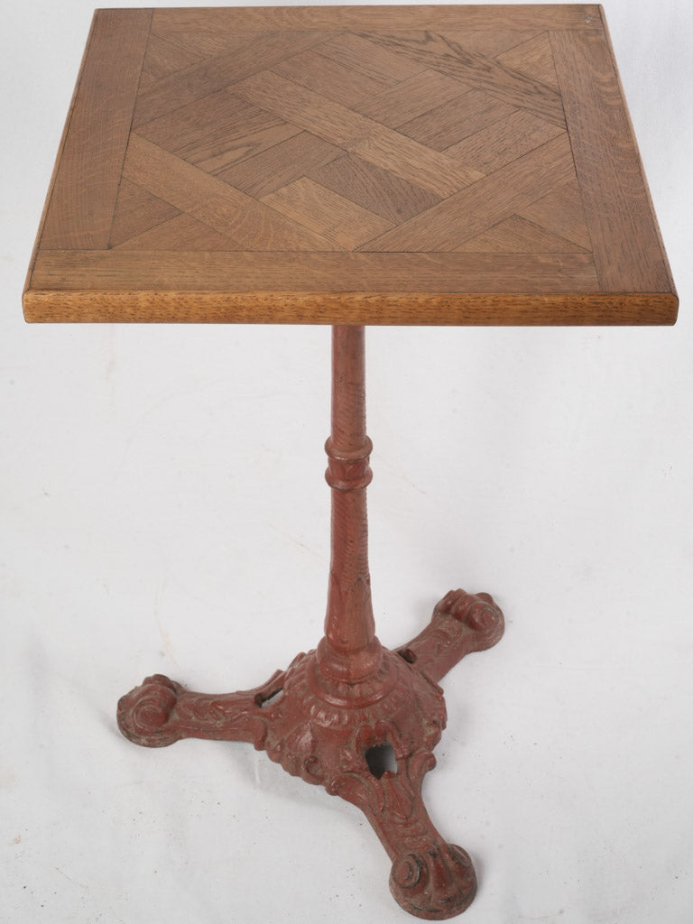 Geometric-patterned oak pedestal table  