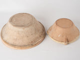 2 terracotta bowls w/ creamy yellow glaze