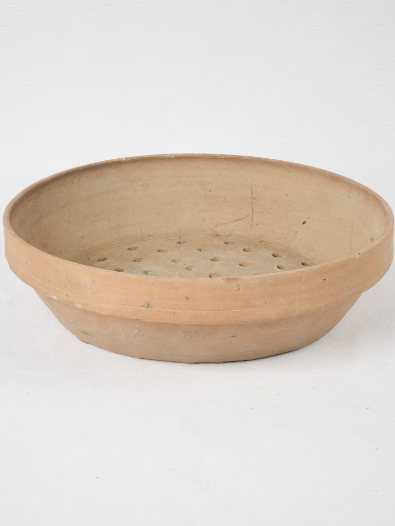 Antique terracotta French strainer bowl