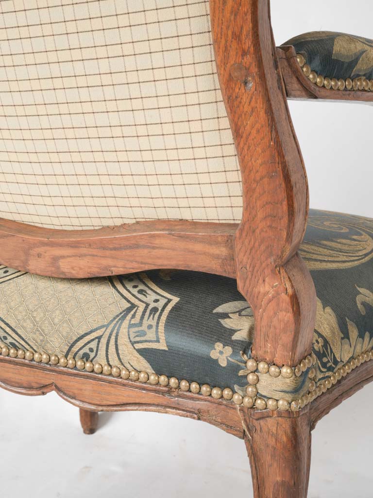 Intricately carved oak period armchairs