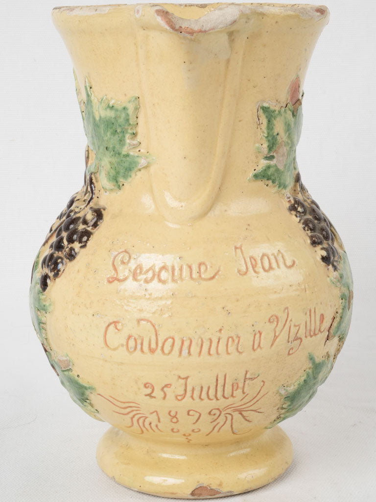 Aged French yellow ceramic pitcher
