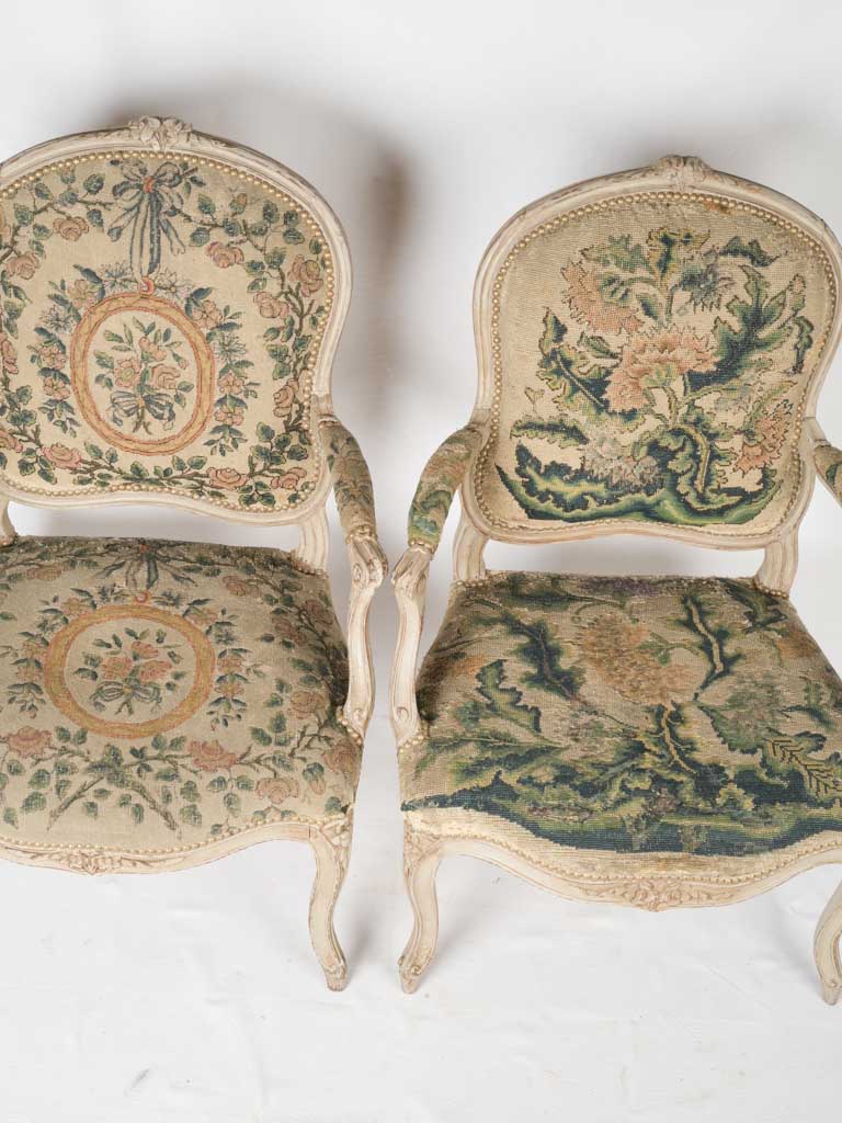 Intricate French cabriole armchairs