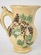 Collectible engraved yellow pitcher antique
