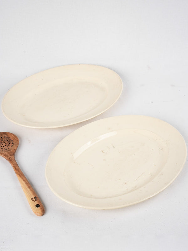 Antique cream French earthenware platters