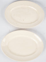 Pair of antique French Digoin earthenware platters - cream 16¼"