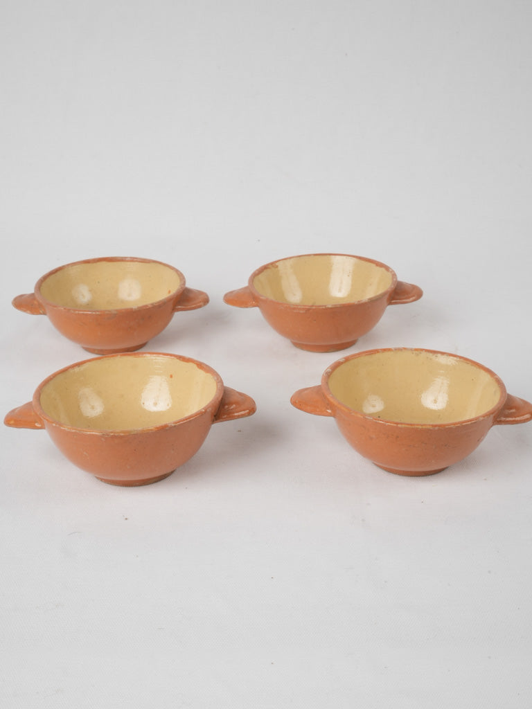 Antique orange French soup bowls