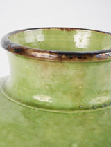 Aged ceramic vase with green finish