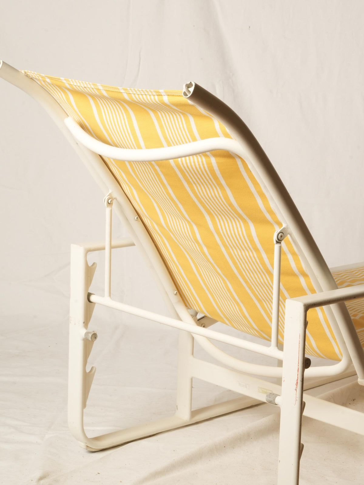 Pair of White Poolside Sun Loungers with Yellow Striped Sling Seats
