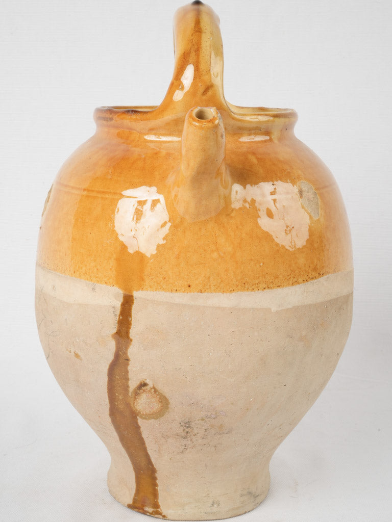 Rich ocher demi-glaze pottery pitcher