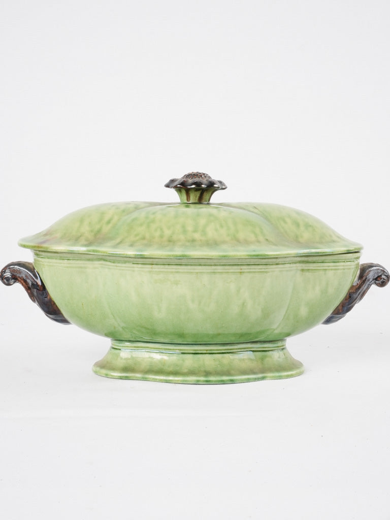 Ornate flower-knobbed green ceramic tureen