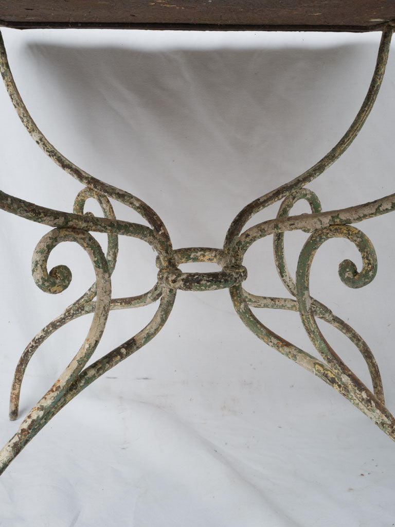 Time-worn French wrought iron table